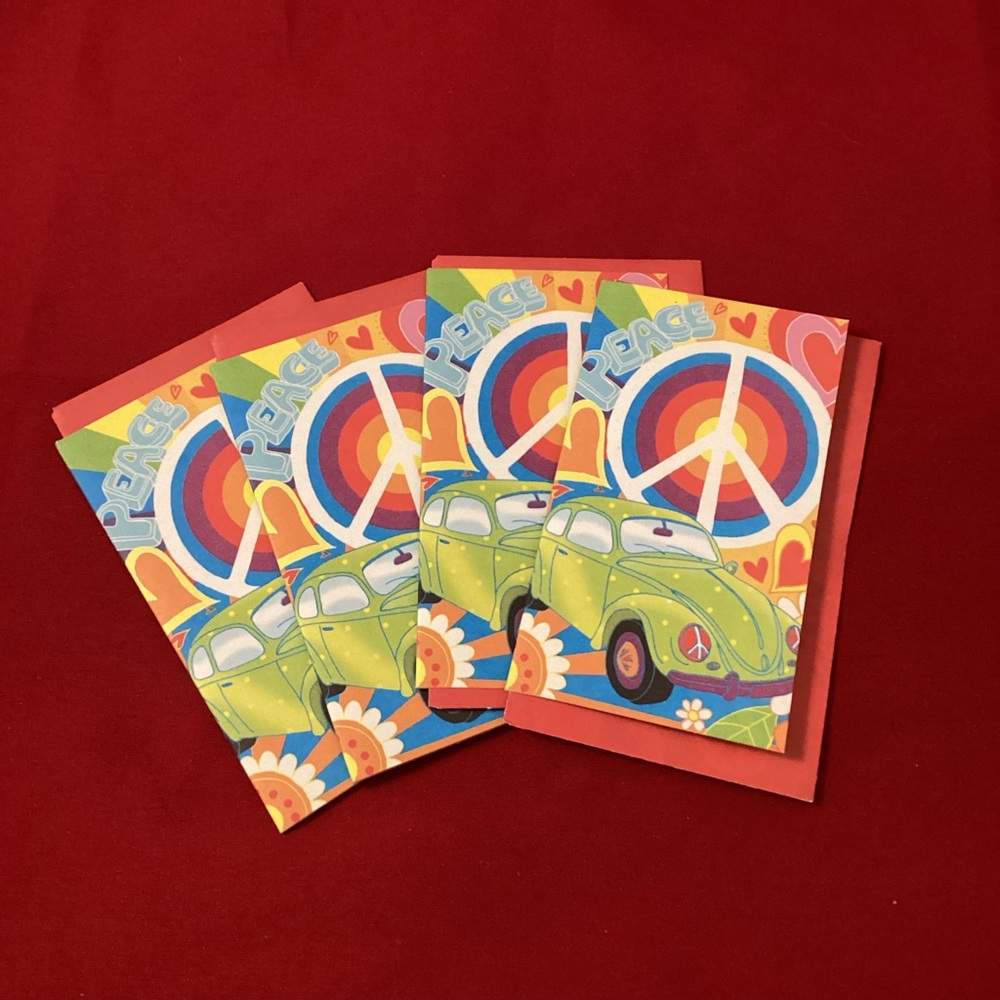 Four small peace and love blank greetings cards with matching envelopes